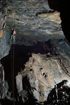 Abseiling from lofty heights underground adventure exploring caving
